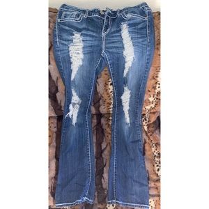 dark-washed boot cut jeans.